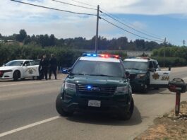 Officers searching for man possibly armed with handgun