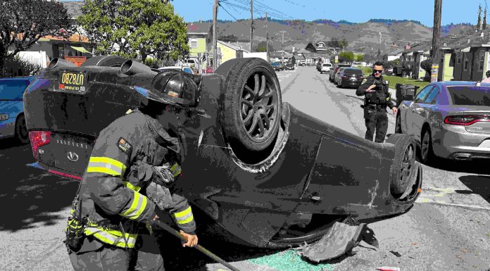 Photo Story: Two-vehicle crash on Center Street A Watsonville firefighter cleans up at the scene of a two-vehicle crash Tuesday afternoon on Center Street in Watsonville.