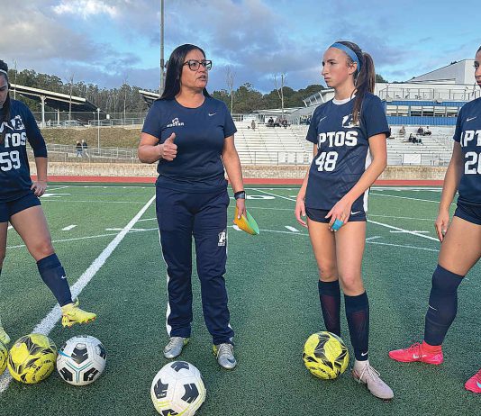 National leadership award lands in local hands Gina Castañeda (second from left) works with the girls varsity soccer team at Aptos High School