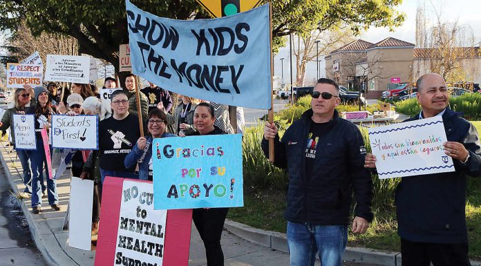 Protest of teacher layoffs continue Pajaro Valley Unified School District teachers and staff are joined by community supporters early Tuesday morning at The Towers in Watsonville to rally against teacher layoffs.